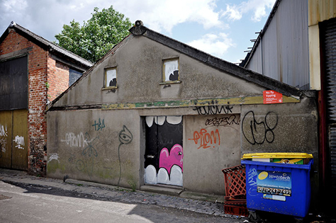 An abandoned Bristol building appears to have a face