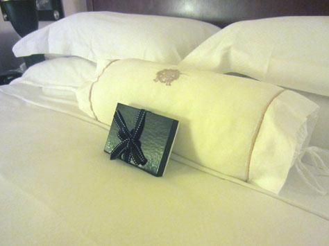 Beribboned box on my pillow at Mark Hopkins