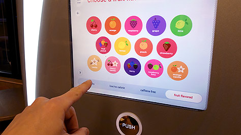 A Coca Cola Freestyle touchscreen soda fountain