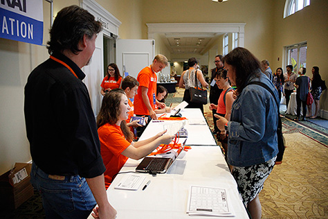 Shane McWhorter and volunteers on the registration desk