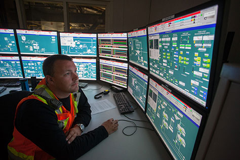 Control-room operator monitoring production