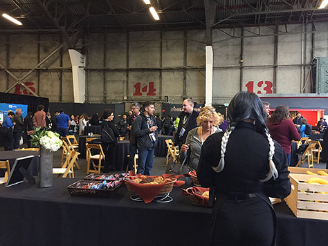 Attendees hanging out in the dining area